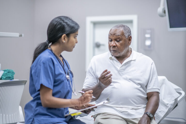 JJ_Senior male patient speaking with doctor